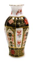 A Royal Crown Derby porcelain Old Imari pattern vase, of fluted baluster form, pattern number 1128,