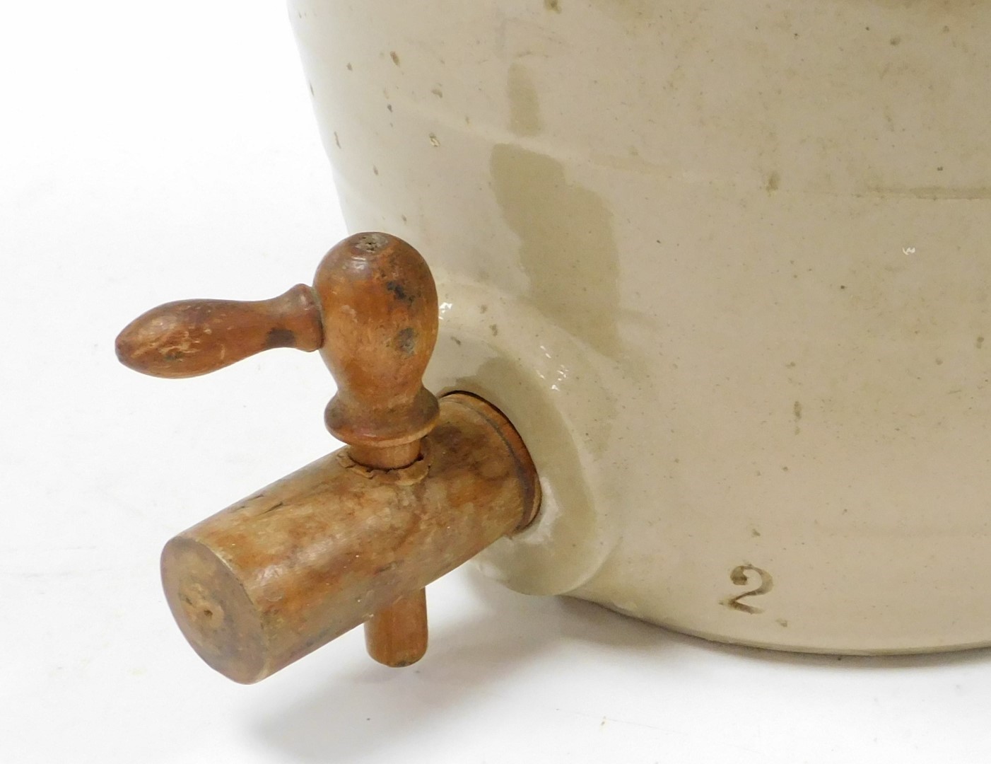 A late 19thC stoneware cider barrel, with moulded banding, and wooden tap, 36cm high. - Image 2 of 2