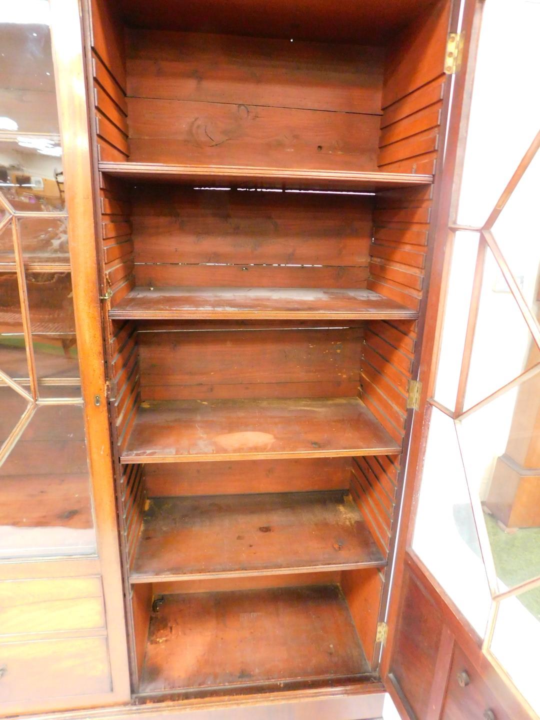 A George III mahogany display cabinet, the outswept pediment over a pair of astragal glazed doors, w - Image 2 of 2