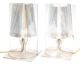 A pair of late 20thC Kartell perspex table lamps, with integral fluted shades, 31cm high.
