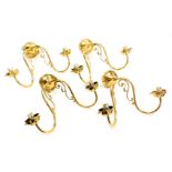 A set of four Art Nouveau style twin branch brass wall lights, 34.5cm wide.