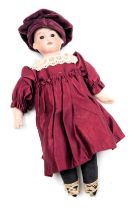 An Armand Marseilles bisque head doll, A.M.-12/0, with a fabric body, wearing a Tudor style dress, 2