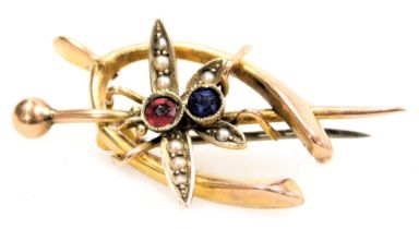 A Victorian 9ct gold seed pearl, ruby and sapphire brooch, formed as a horseshoe, pin and insect, 3.