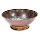 A 19thC copper bowl, possibly for containing Catholic holy water, with an embossed medallion to the