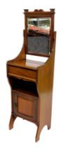 A late Victorian mahogany gentleman's shaving stand, the swing frame mirror inset a rectangular beve