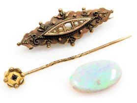 A Victorian 9ct gold and seed pearl set brooch, central stone lacking, 9ct gold and sapphire tie pin