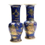 A pair of Carltonware chinoiserie lustre vases, decorated with pagodas and figures in a landscape, n
