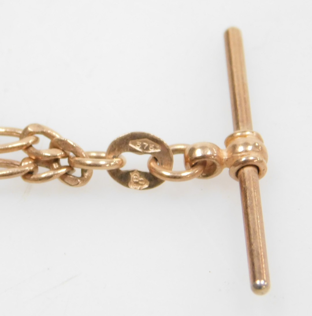 A 9ct rose gold figaro link Albert chain, with a lobster claw clasp, and T-bar as fitted, 4.4g. - Image 2 of 2