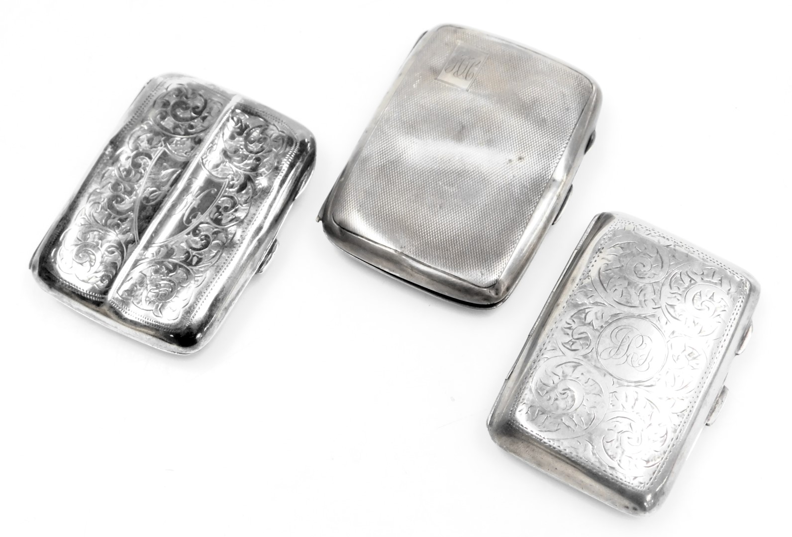 A George V silver cigarette case, foliate engraved, shield reserve monogram engraved, Birmingham 191