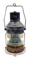 A 20thC Meteorite Trawling ship's lantern, with blue metal casing, serial number P112246, 51cm high.