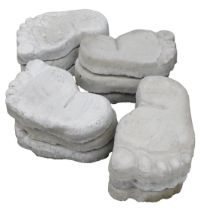 Twelve concrete stepping stones, modelled as feet, 26.5cm wide.