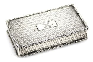 A William IV silver snuff box, with engine turned decoration, within a foliate scrolling gadrooned r