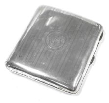 A George V silver cigarette case, with engine turned decoration, circular reserve monogram engraved,