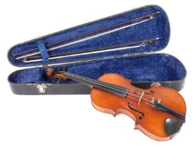A late 19thC German violin, with a two piece back, bearing label, Wilhelm Nurnberger, Geigenmacher,