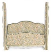 A cream and turquoise blue painted wooden double bed frame, with floral decorated upholstered headbo