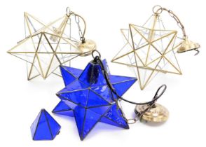 Two metal framed tetrahedron star shaped ceiling lights, 35cm and 31cm high, together with a blue gl