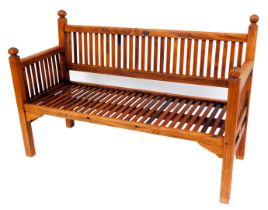 An early 20thC two seater bench, built from the timbers of HMS Defiance, the last wooden line of bat