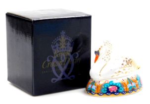 A Royal Crown Derby Imari swan paperweight, gold stopper, boxed.