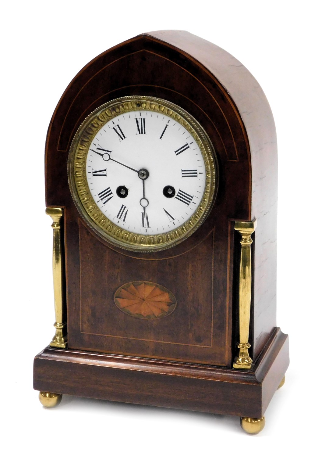 An Edwardian mahogany cased mantle clock, circular enamel dial bearing Roman numerals, eight day mov