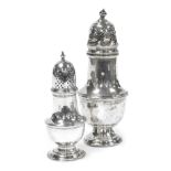 An Elizabeth II silver sugar sifter, of baluster form, Birmingham 1958, and a further Victorian silv