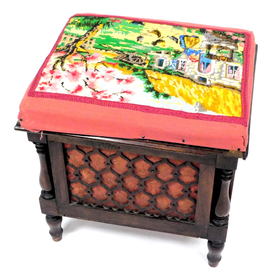 A Victorian mahogany piano stool, the hinged wool work seat decorated with a farmyard scene, above f