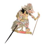 A vintage Wayang Kulit shadow puppet, with horn handle and stick operated articulated left hand, 87c