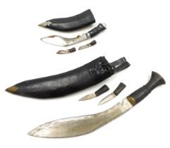 A Nepalese kukri, with a leather sheath, 40cm high, and another smaller, 25cm high. (2)