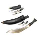 A Nepalese kukri, with a leather sheath, 40cm high, and another smaller, 25cm high. (2)