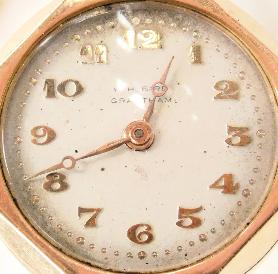 A mid century 9ct rose gold lady's wristwatch, for W H Bird of Grantham, circular silvered dial bear - Image 2 of 3