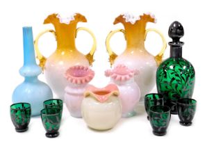 A group of Victorian opaline glass vases, a turquoise glass vase, and a pair of amber twin handled v