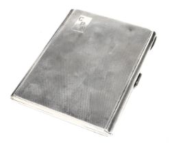 A George VI silver cigarette case, internally dedication engraved, with engine turned decoration, re