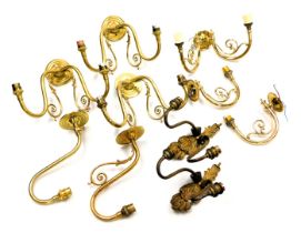 A group of brass twin branch wall lights, various styles. (qty)