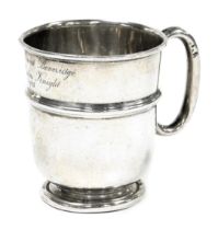 A George V silver mug, presentation engraved, Sheffield 1935, 4.17oz.