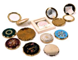 A group of Stratton and other vintage compacts, variously decorated, some boxed. (qty)