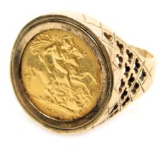An Elizabeth II gold half sovereign 1982, in a 9ct gold ring mound, cut, approx size U, 11.1g.