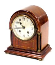 An Edwardian mahogany cased mantel clock, circular silvered dial bearing Arabic numerals, eight day