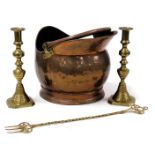 A Victorian copper helmet shaped coal scuttle, 35cm wide, pair of brass candlesticks, 27cm high, and