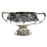 An Edward VII silver twin handled pedestal bowl, Lee Hendon Gun Club Scratch Cup, embossed with bow