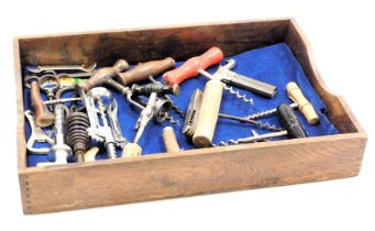 A group of vintage corkscrews, champagne tap, bottle openers and a pocket knife. (qty)