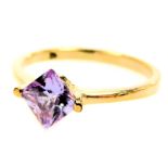 A pale amethyst solitaire ring, princess cut, in yellow metal, size O, 1.8g.