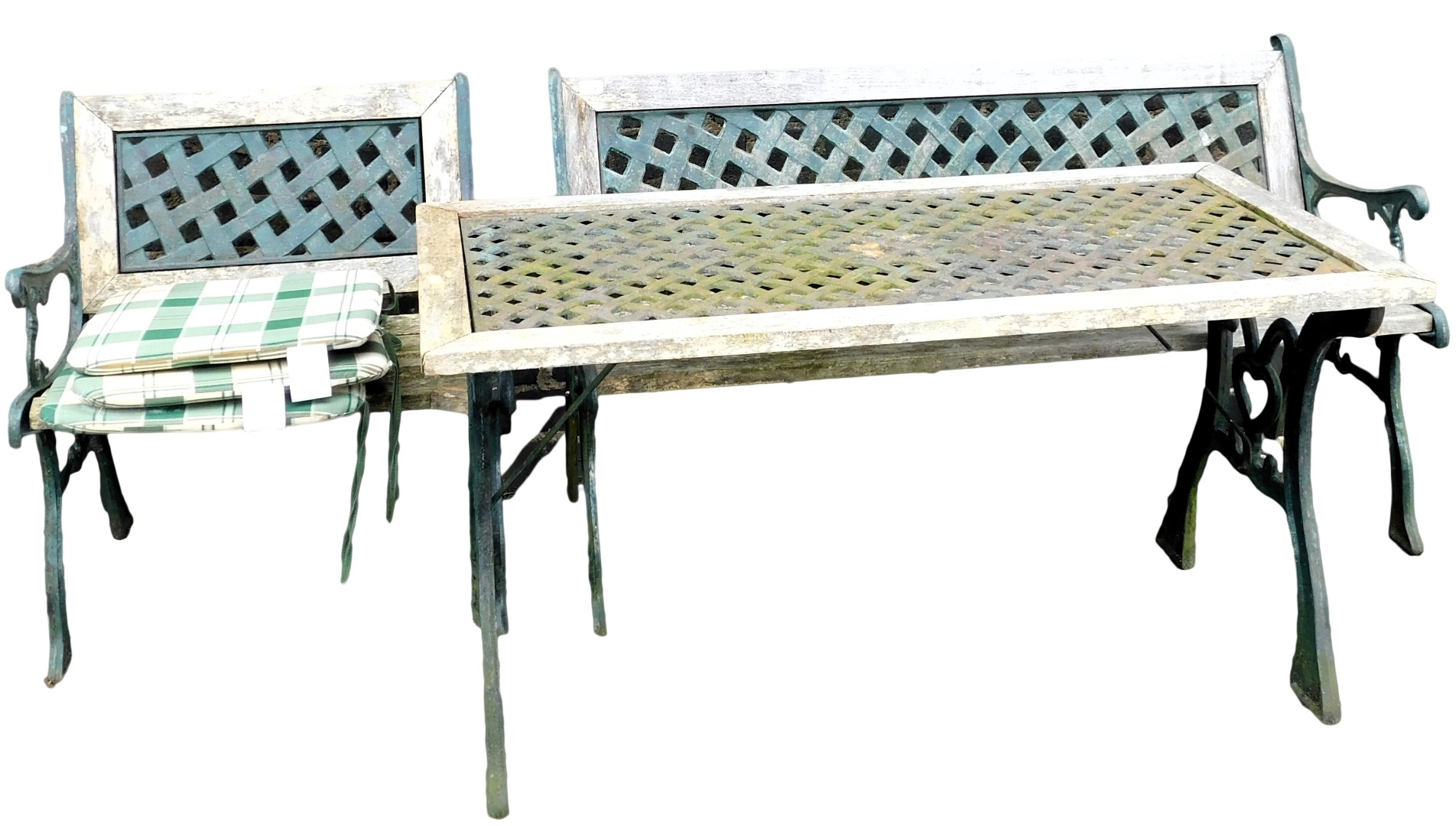 An oak and cast iron garden set, the iron painted green, comprising a two seater bench, 125cm wide,