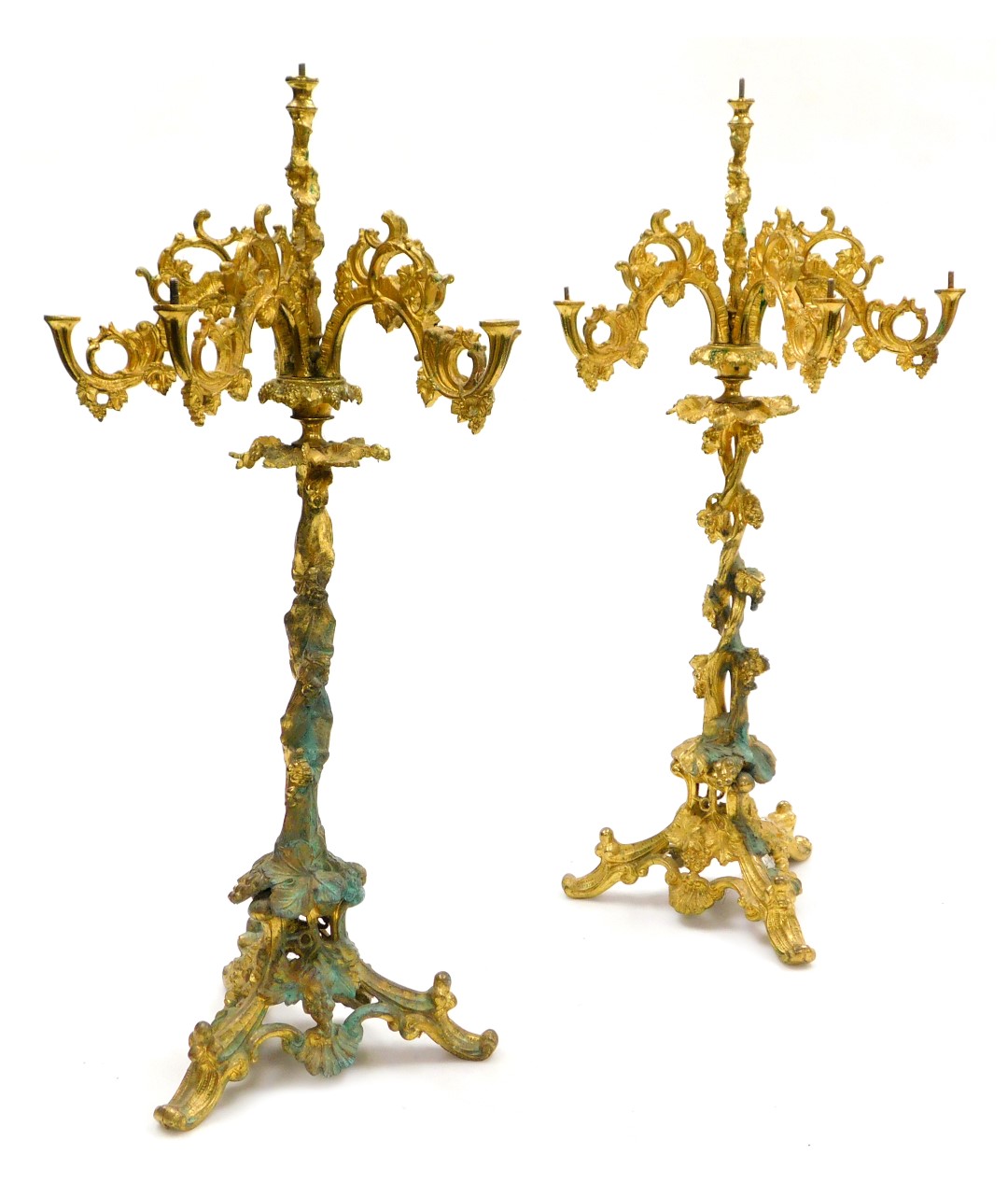 A pair of late 19thC brass five branch candelabra, sconces lacking, cast as vines, 58cm high.