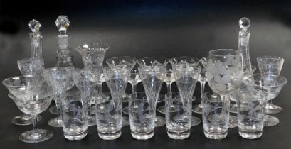 A group of Edwardian and later cut glass table wares, including six wine glasses, with star etched b