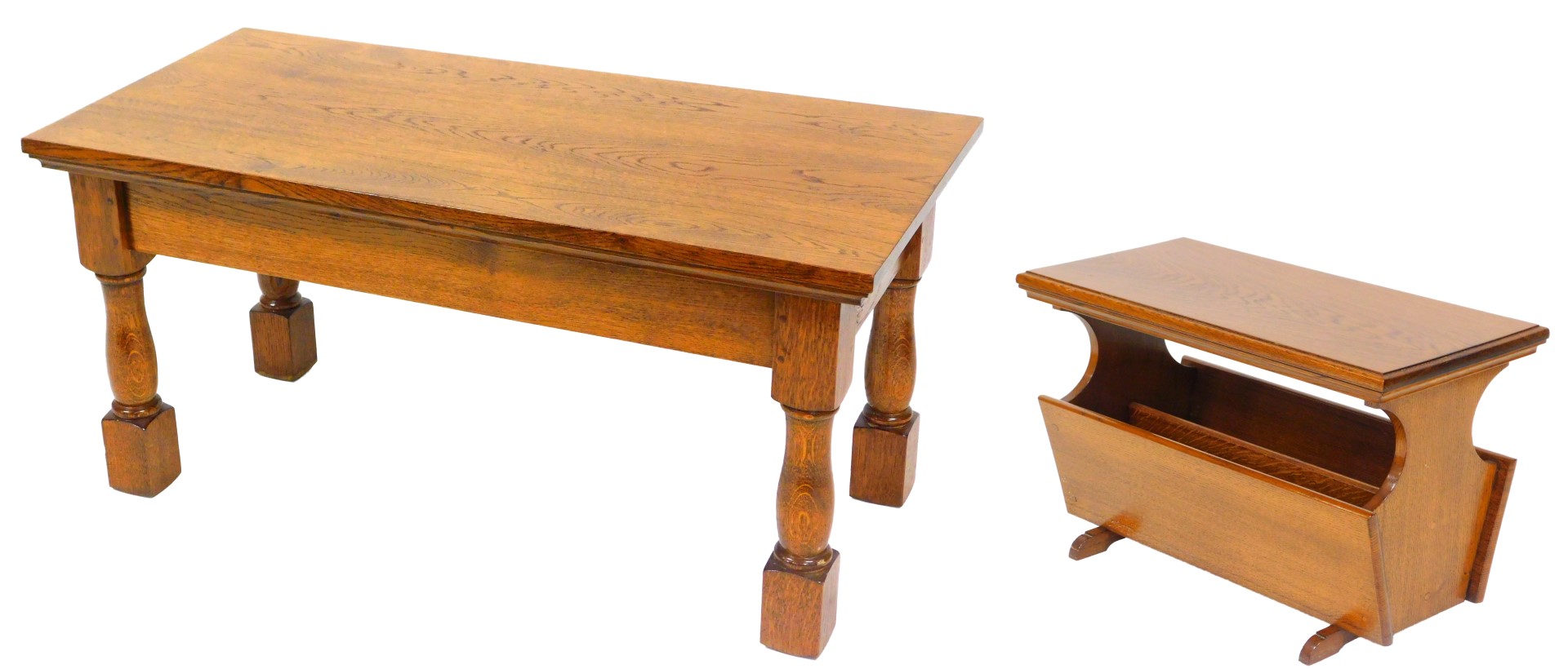 A rectangular oak coffee table, raised on turned and square block legs, 51cm high, 107cm wide, 50.5c