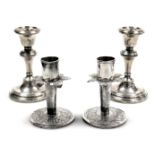 A pair of George V loaded silver candlesticks, Chester 1913, 5.85oz all in, 9.5cm high, together wit