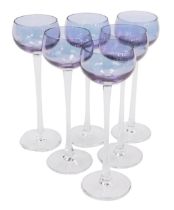 A set of six early 20thC continental long stemmed liqueur glasses, with purple lustre bowls, 16cm hi