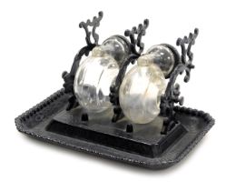 A Victorian novelty cut glass and cast iron framed double inkwell of double horn form, 19cm wide.