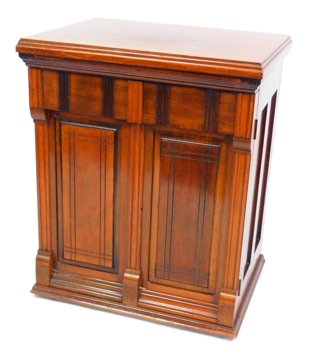 A Victorian mahogany sewing cabinet, containing a Jones Family C.S treadle sewing machine, 77cm high