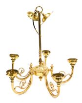 A brass five branch chandelier, the arms with scrolling foliate detailing, 47cm high.