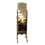 An early 20thC mahogany cheval mirror, with an unframed mirror plate, raised on cabriole legs, 159cm